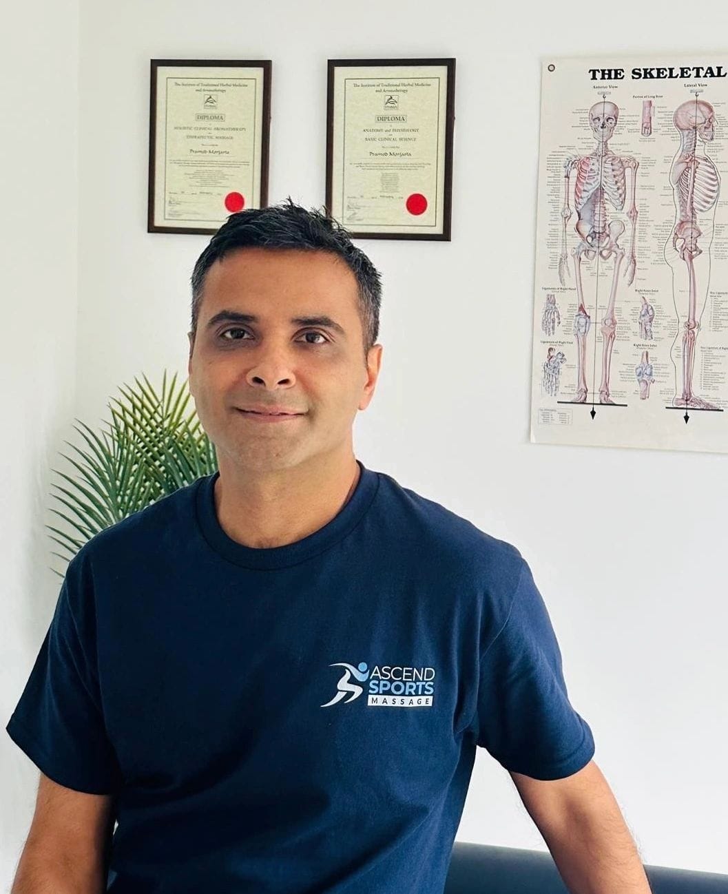Pramod, sports and remedial massage therapist, in his Pinner clinic